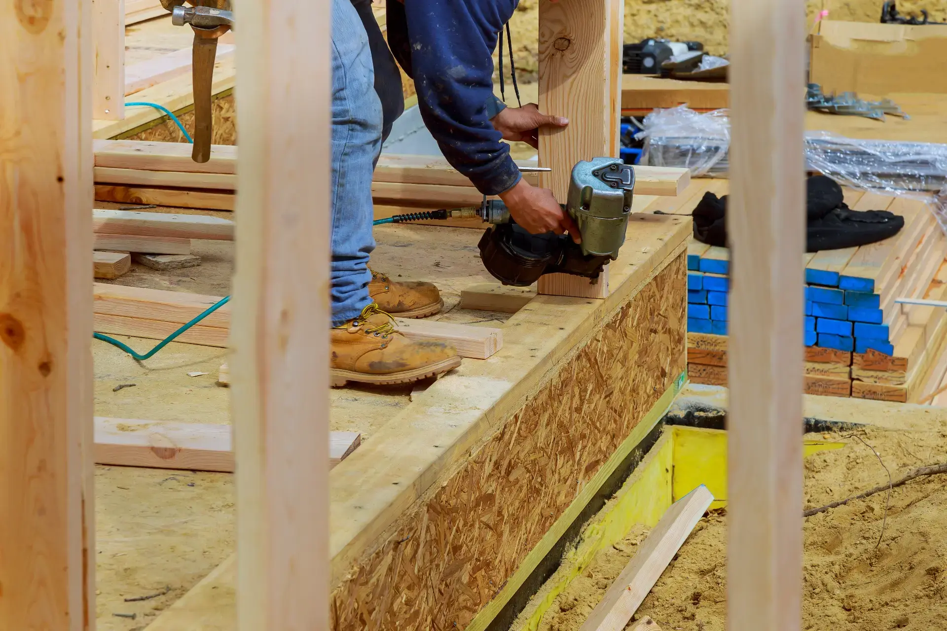 Framing contractor building interior walls in a New Jersey home