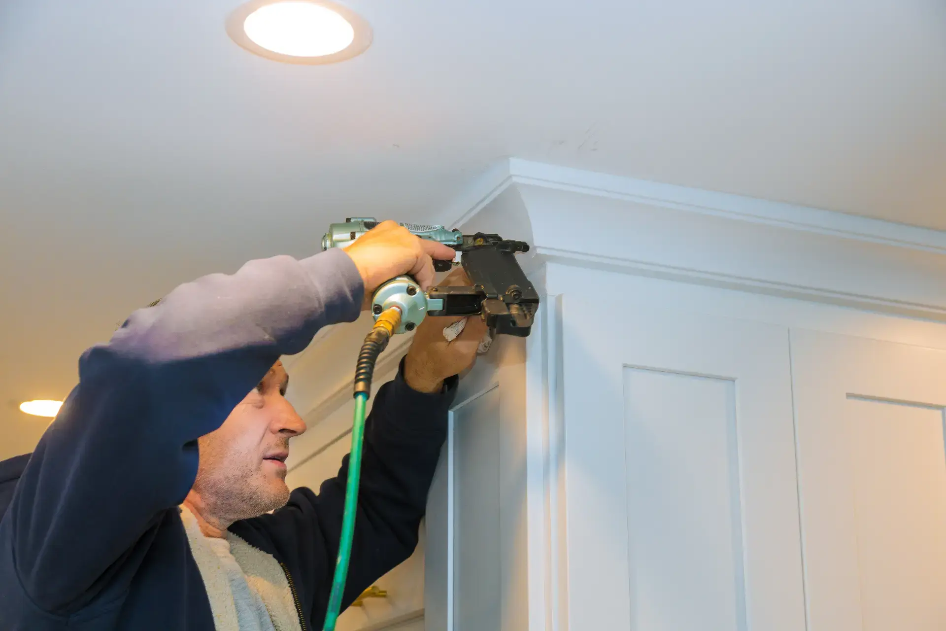 Baseboard and crown molding installation in a New Jersey interior